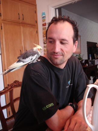 April 3, 2007 (I'm 37 years old) Sitting in the same kitchen with the same bird, Condorito, Why do I look different? I'm 18 years older than the picture above! Notice that I have a lot less hair, but Condorito has kept all her feathers! Lucky bird! It looks the same after 20 years!