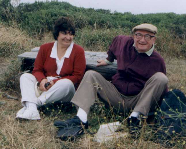 August 1998. The Bench on top of Sweeney Ridge (near San Francisco). The fog prevents a clear view beyond. My mom, Lucia (59), and my dad, Rene Tapon (68).