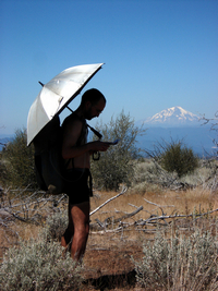Umbrellas provide protection from the sun and rain while you examine your map