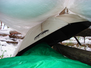 When snow blew sideways under the tarp, I plugged the hole with my umbrella in the Wind River Range