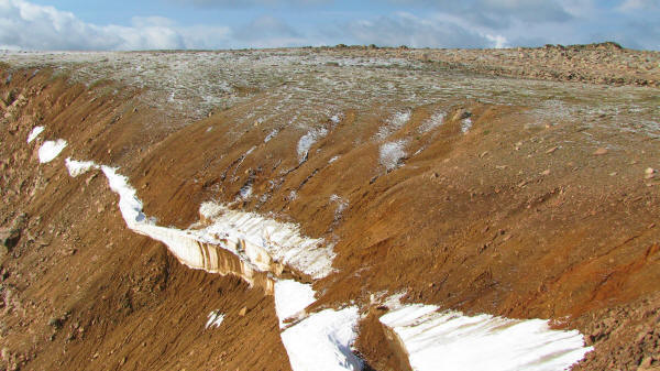 The fresh snow started melting away by noon.