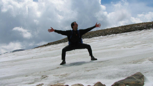 I'm standing on the Continental Glacier. This glacier is cool because it rests on the Continental Divide. The melt off of the glacier on my left foot goes to the Pacific Ocean and while the melt off from my right foot goes to the Atlantic Ocean. 