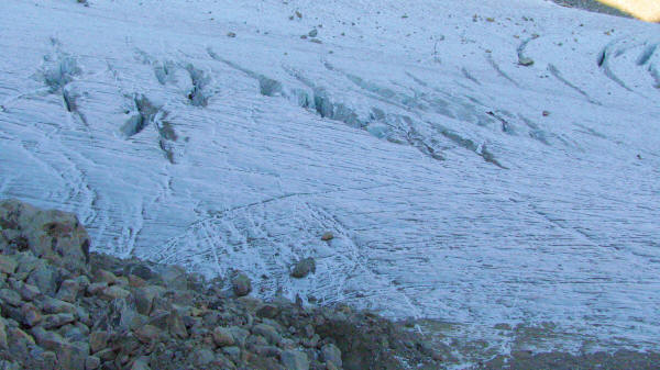 I got up high to avoid some crevasses but eventually I had to go down and confront them. I jumped over a dozen crevasses, hoping that I didn't slip and fall into one of them.