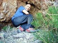 I was bushwhacking through the brush, thorn-infested vegetation in New Mexico when I found this micro-cave. The picture doesn't really show you how deep it goes. Then again, it didn't really go that deep.