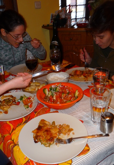 Greek food with moussaka casseroles and a Greek salad