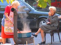 These ladies are cooking up a traditional Macedonian sauce made of red peppers called ajvar.
