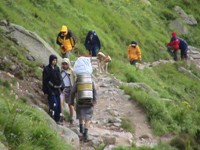 This photo is about priorities. When we backpack, you can only carry the essentials. For most people that means things like a sleeping bag, clothes, and food. For this Slovakian, it was a keg of beer. 