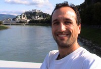 A lame self-portrait, but you do see the impressive Fortress Hohensalzburg in the background on the hill. 