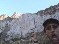 The Transylvanian Alps had spectacular rock faces. I was still above the tree line, so I started to walk fast. Within two hours I found an abandoned (and perhaps haunted) building. It had an owl. A perhaps another visitor as well. It was a scary night. 