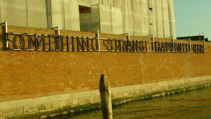 Something strange happened here is an artwork on the wall of Venetian Arsenal by French artist Daniel Firman