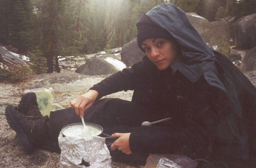Lisa Garrett cooking while camping