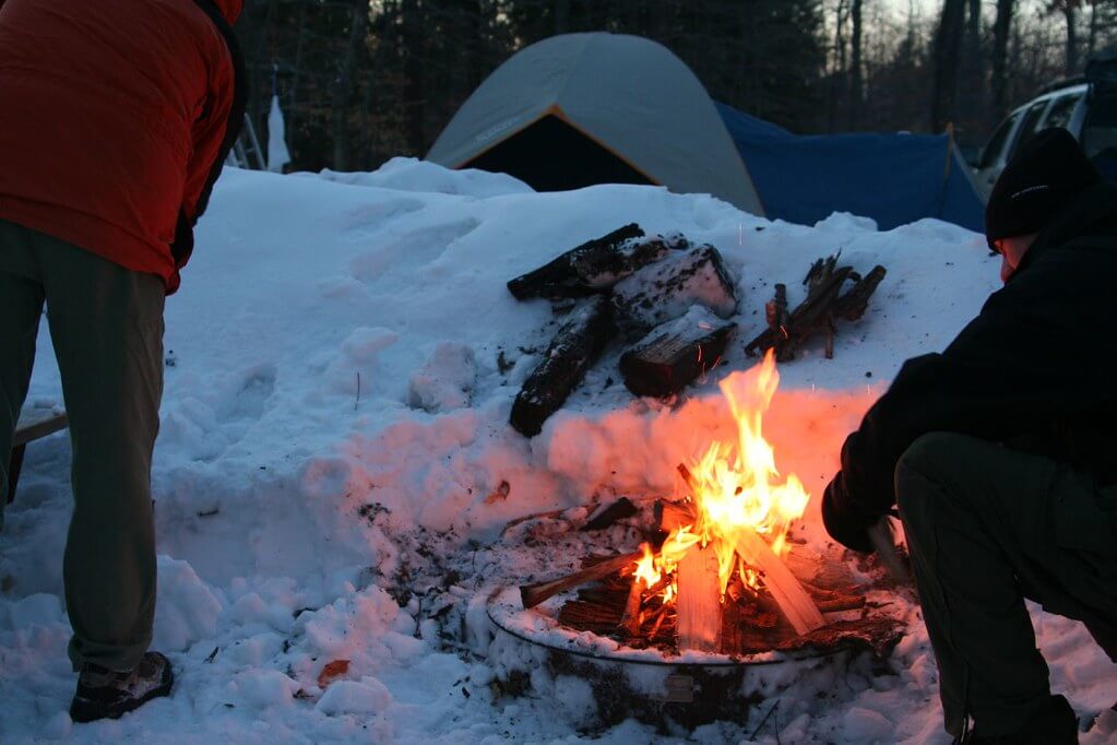 Fire in the snow backpacking camping