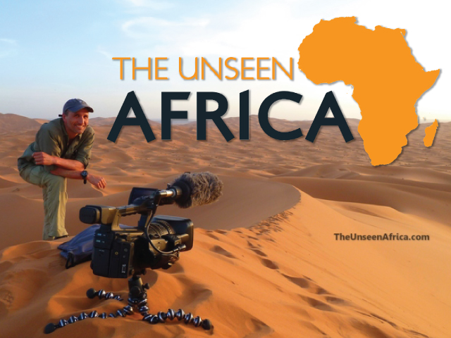 Francis Tapon on a Sahara dune with his trusty Canon XF 300.