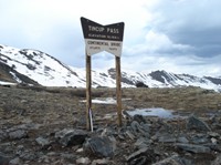 The passes are exposed to wind and sun, so they're often the first places to lose their snow in the spring.
