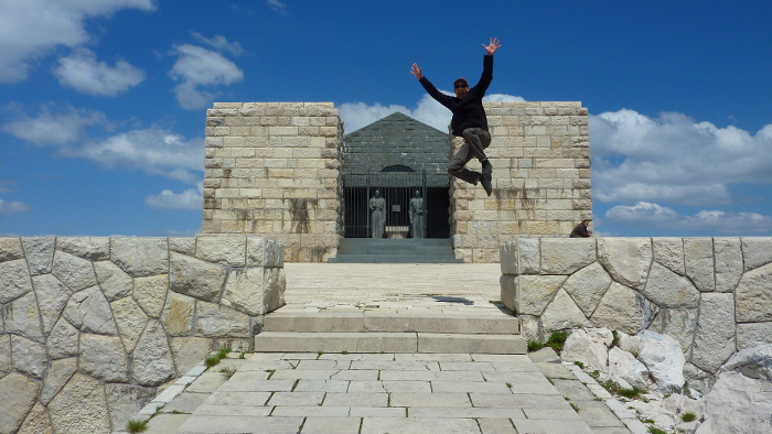 Francis Tapon jumping at Mt. Lovcen in Montenegro. It feels like heaven, but it's the Njegos Mausoleum