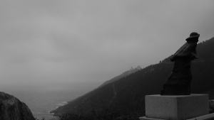 Statue of pilgrim at Fisterra, Spain